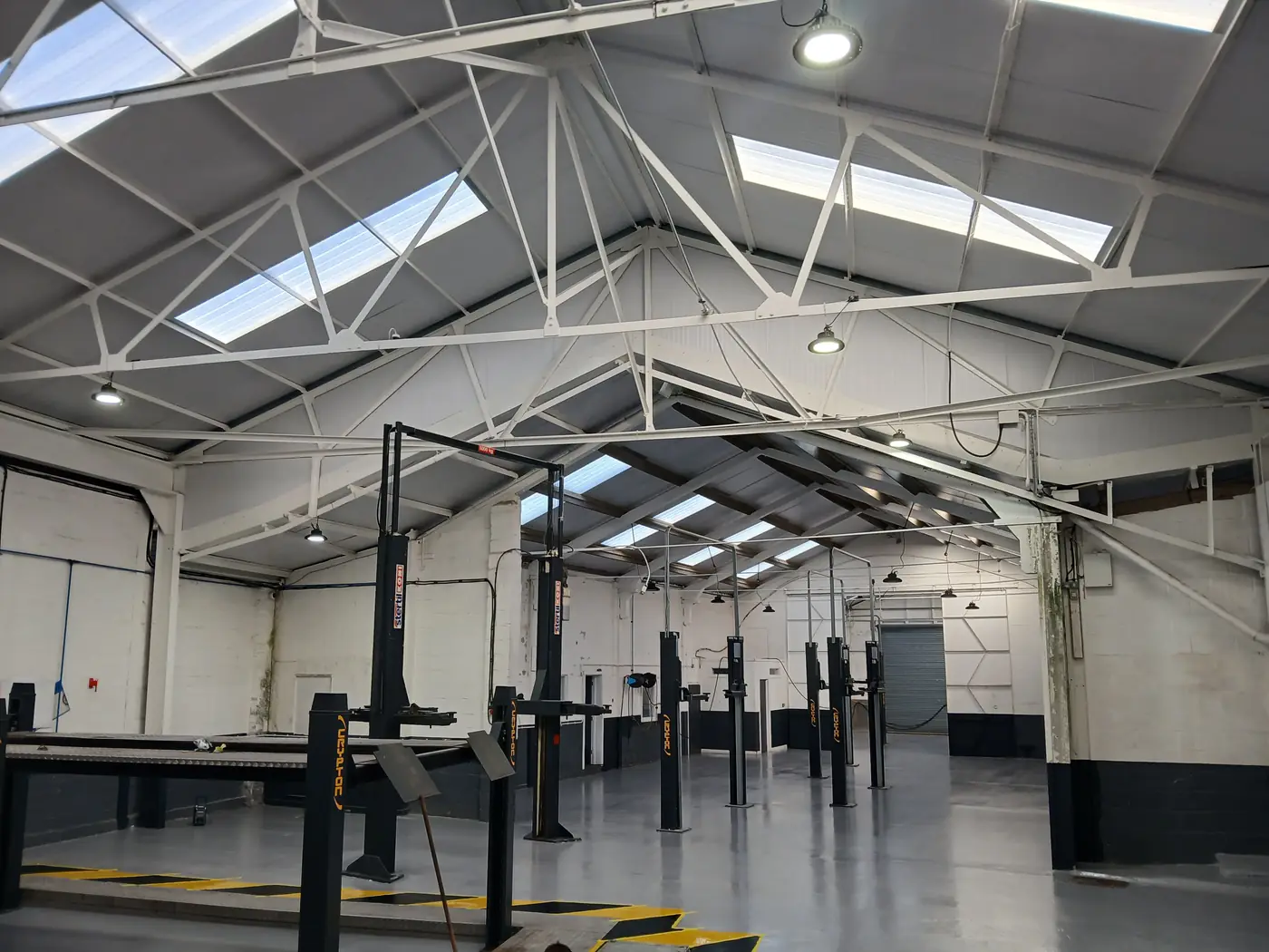 Bright workshop interior under the new roof and roof lights
