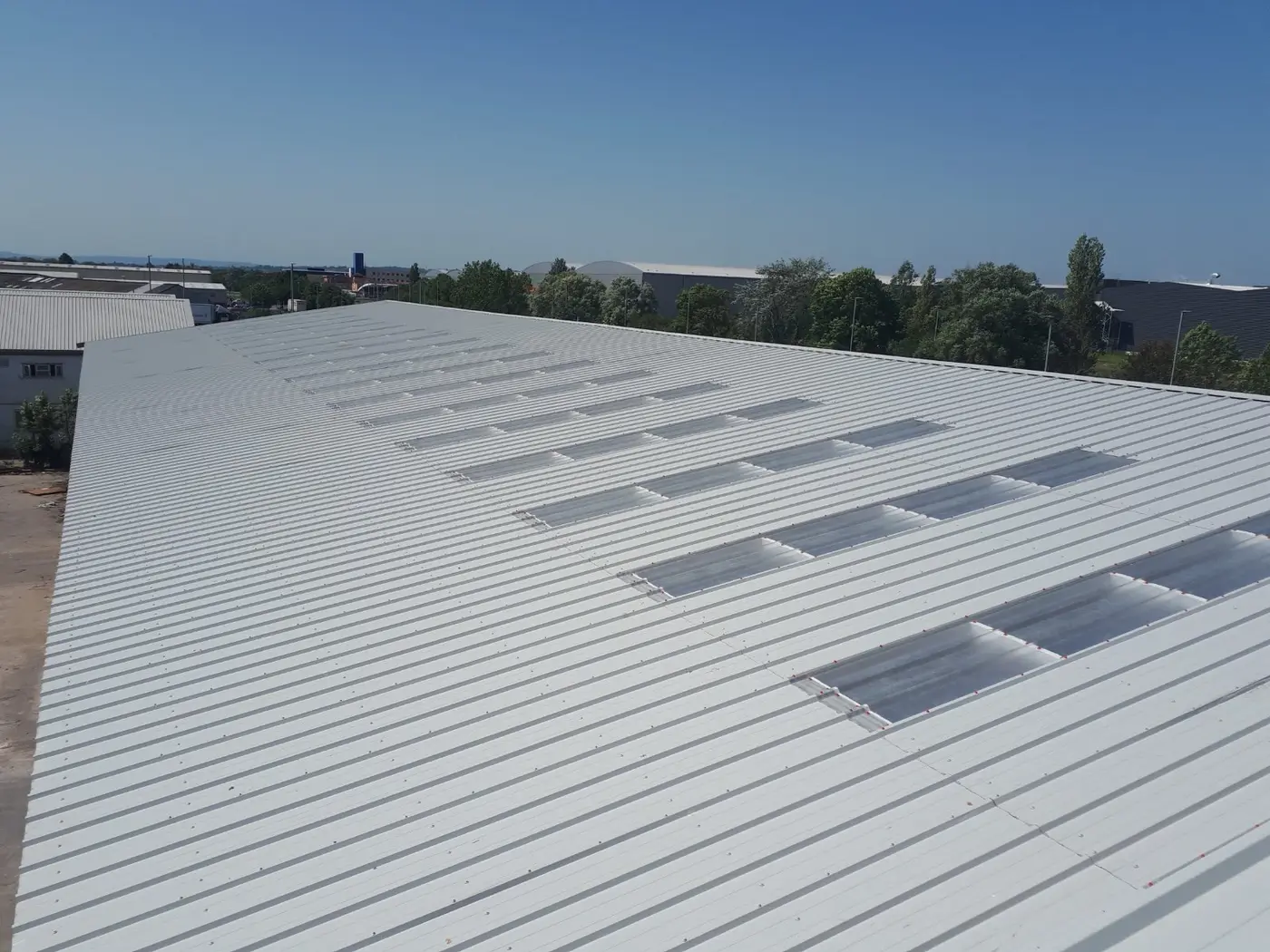 New composite roof with roof lights installed