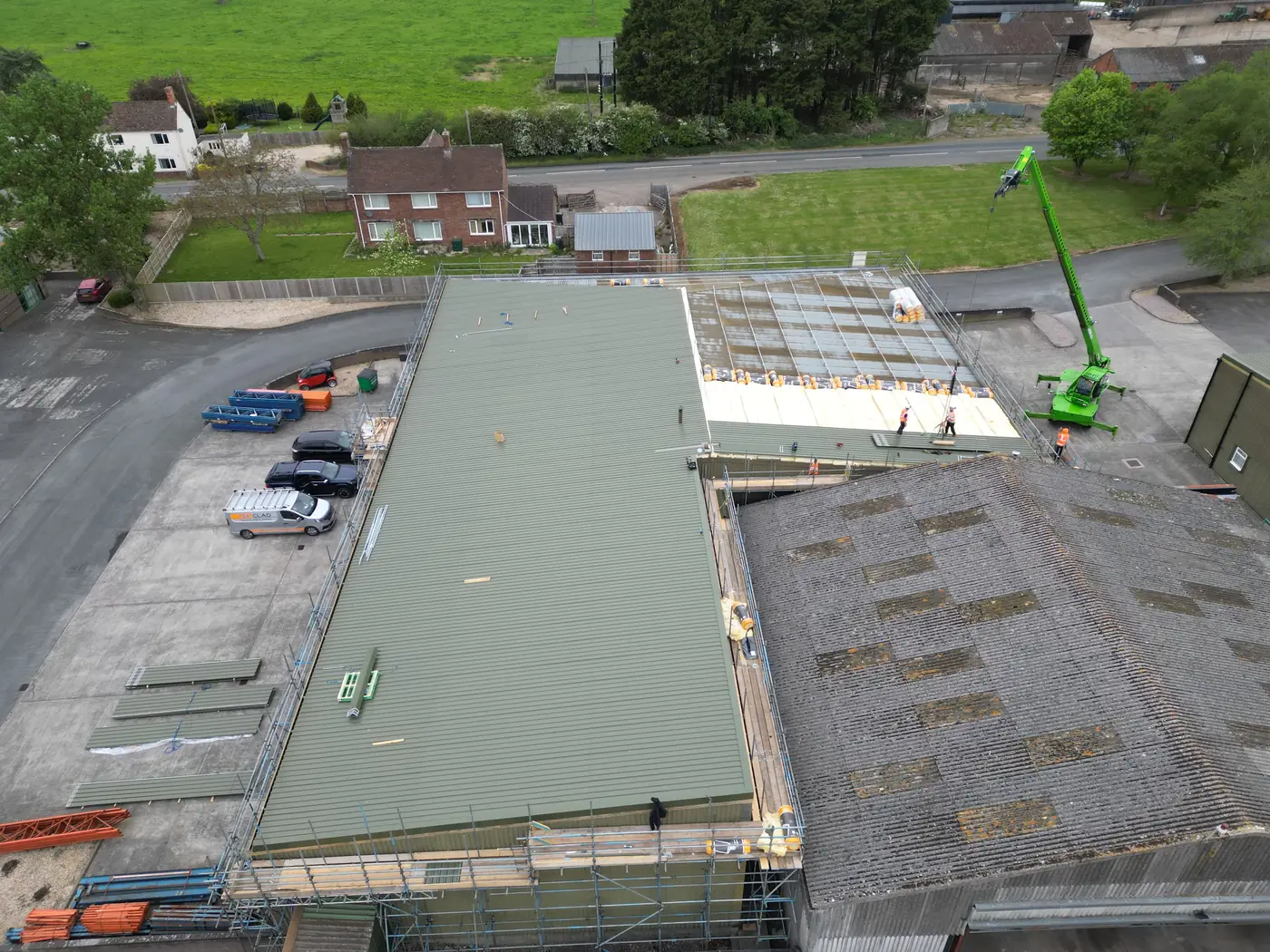 New roof sheets going on beside the original roof