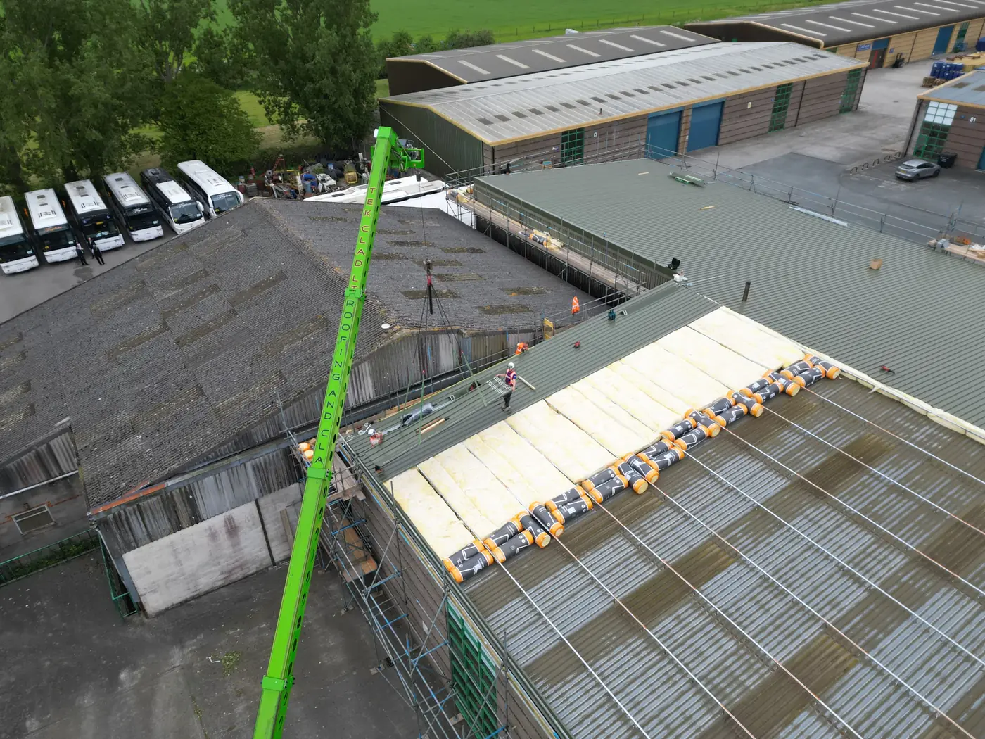 New sheets being lifted onto the roof