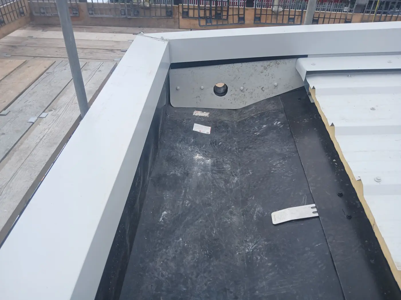 Gutter outlet and colour-matched flashing detail