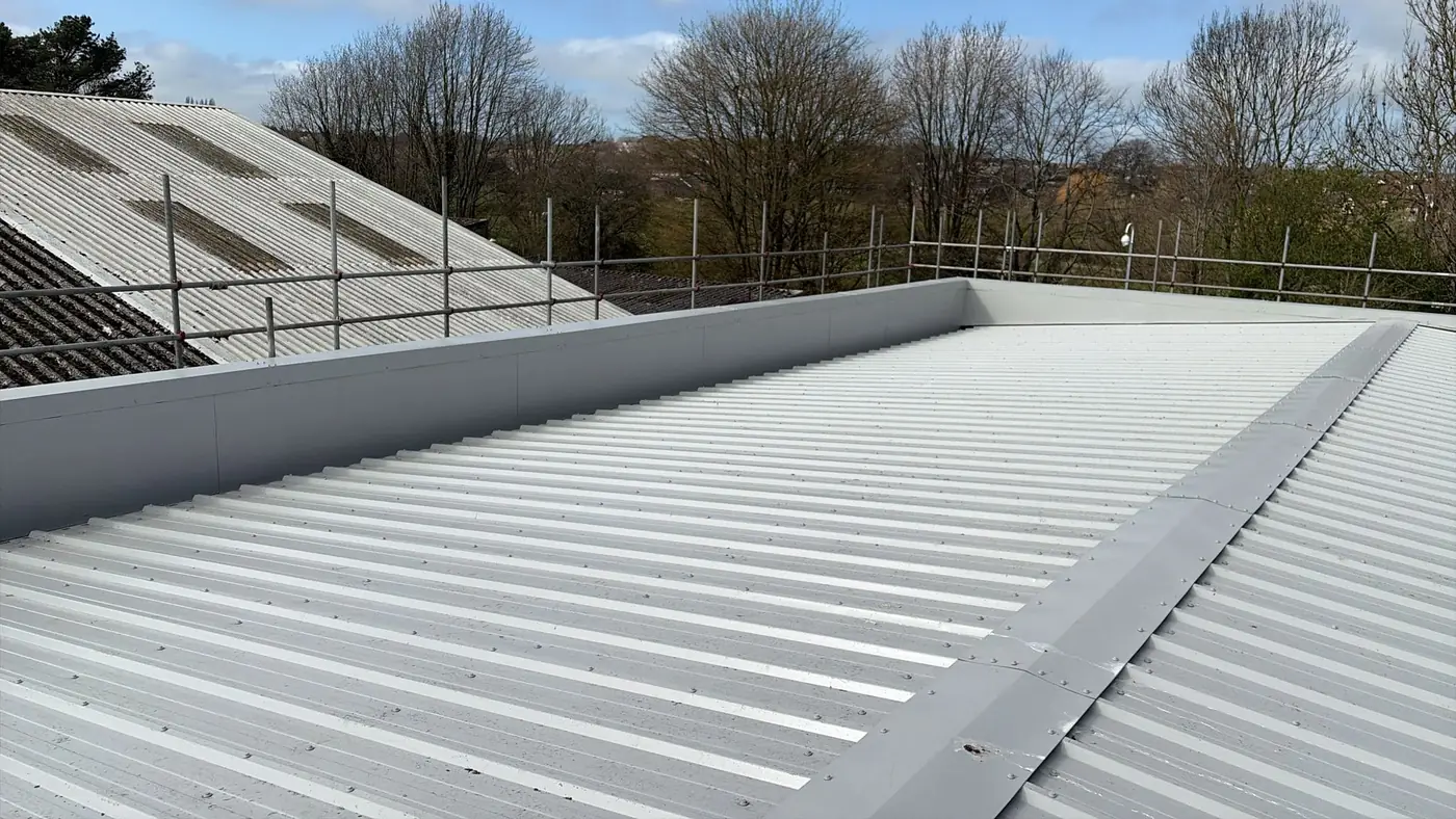 New composite roof with insulated parapet gutter and cappings