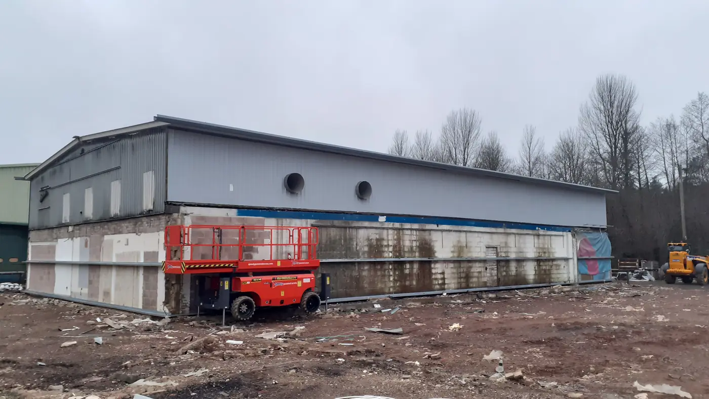 Original cladding and elevations before the strip