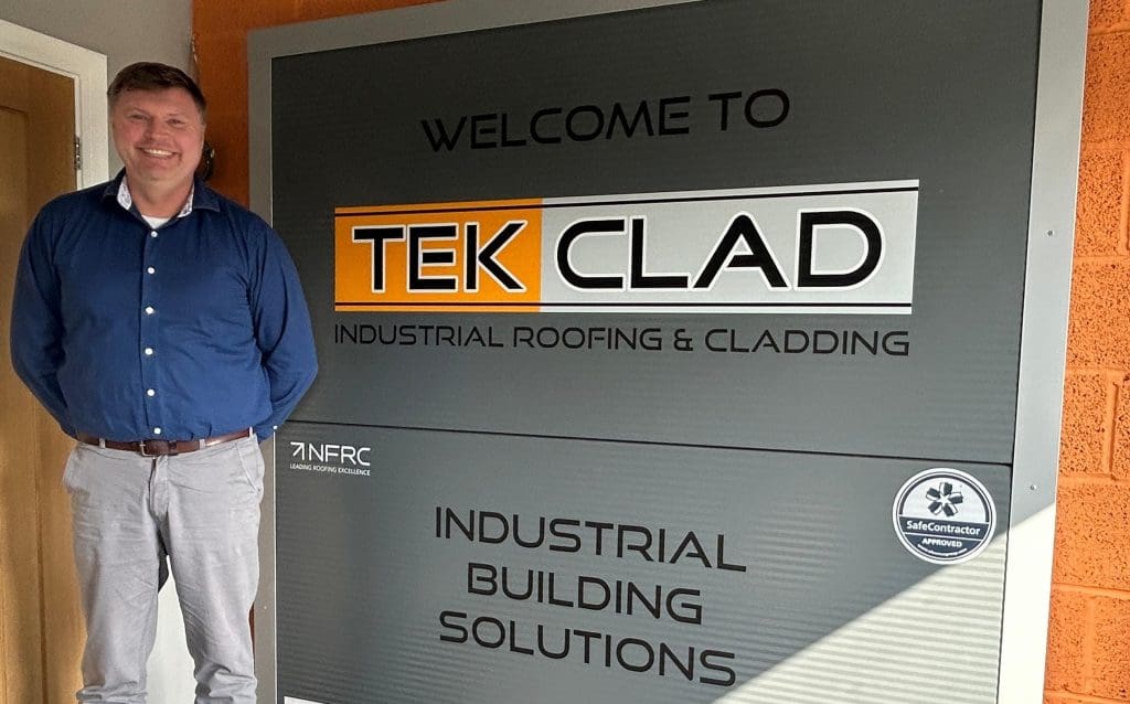 Weymouth roofing and cladding company celebrating 15 years in business in 2025 3 Ian Hambidge with logo landscape crop -